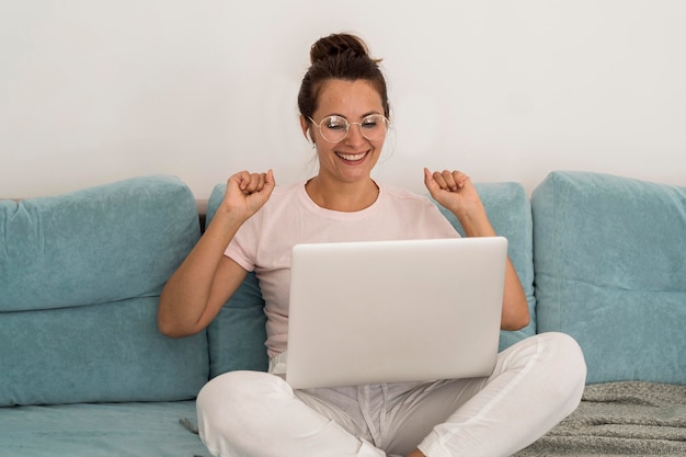 Casual adult woman working at home