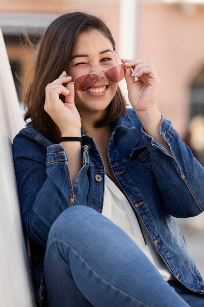 Casual chubby girl in denim outdoors