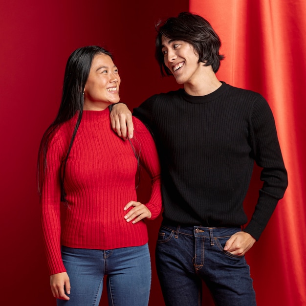 Free photo casual couple posing for chinese new year