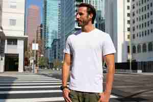 Free photo casual dressed man crossing the road outdoor photoshoot