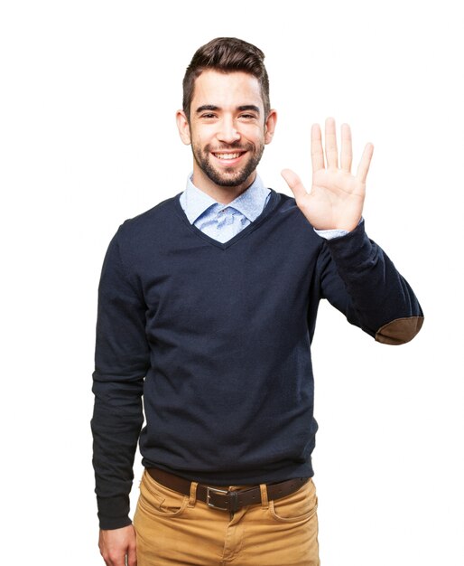 Casual guy showing the five fingers