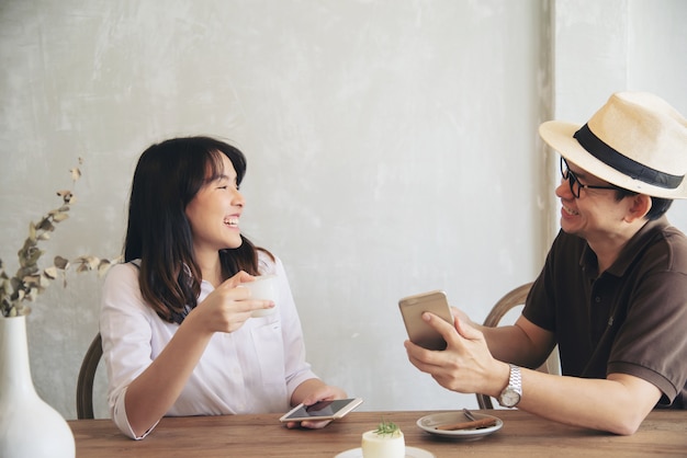 Casual man and woman talking happily