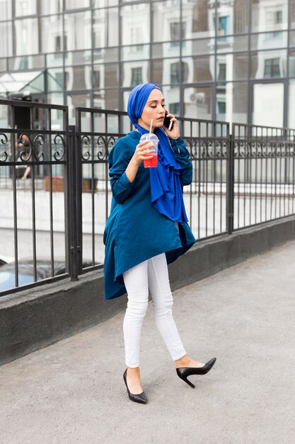 Casual young woman talking on the phone