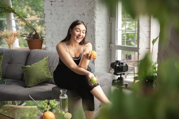 Free Photo caucasian blogger woman make vlog how to diet and lost weight.