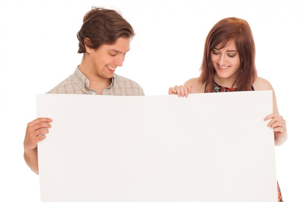 Caucasian couple with blank papers