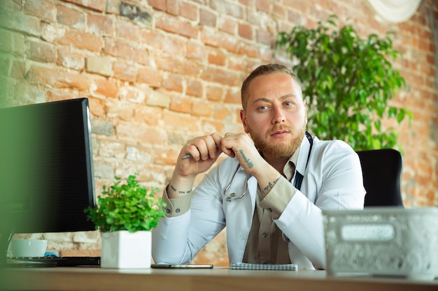 Caucasian doctor consulting for patient