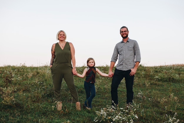 A Caucasian family is spending time at the farm together