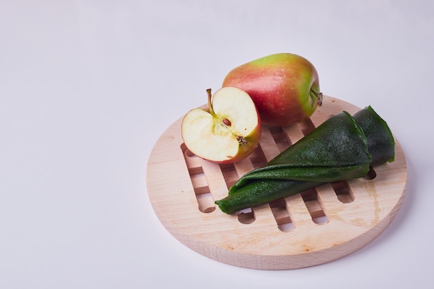 Caucasian fruit lavash with apple on a wooden platter.