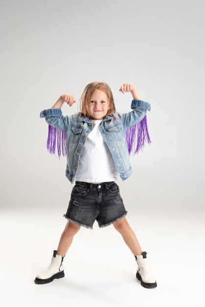 Caucasian girl isolated on white studio background Copyspace Childhood education emotions concept