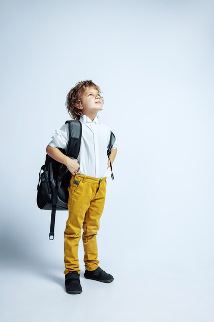 Free photo caucasian male preschooler with bright facial emotions