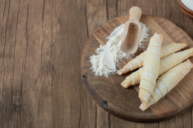 Caucasian mutaki cookies on wooden board.