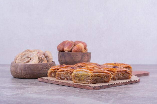 Caucasian pakhlava with dry apple slices and dates