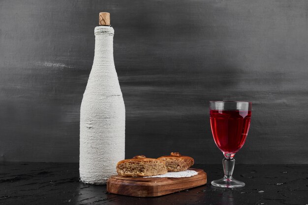 Caucasian pakhlava with a glass of wine. 