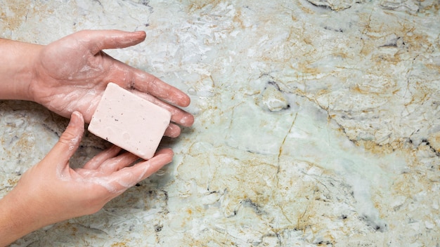 Caucasian person washing hands