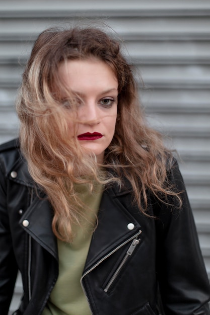 Caucasian punk female with attitude outdoors