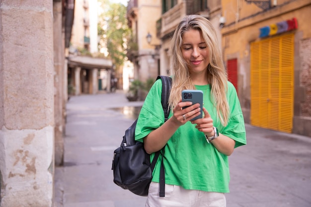 Caucasian woman have chat on phone at the street