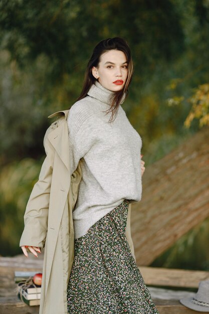 Caucasian woman standing outdoors and posing