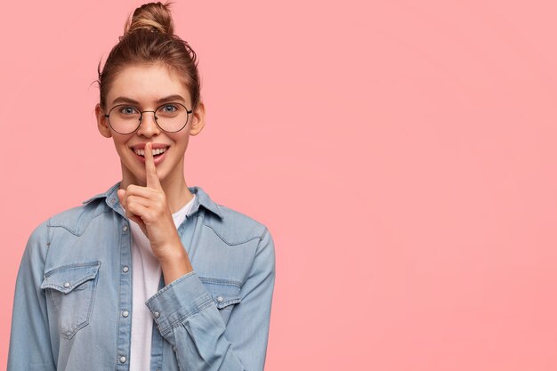 Caucasian woman wearing denim shirt