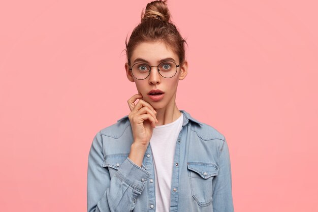 Caucasian woman wearing denim shirt