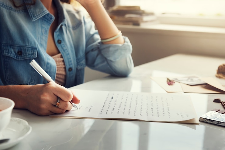 Free Photo caucasian woman writing a letter
