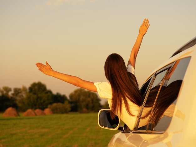 Free photo caucasian women travel relax in the holiday. traveling by car park. happily with nature. in the summer