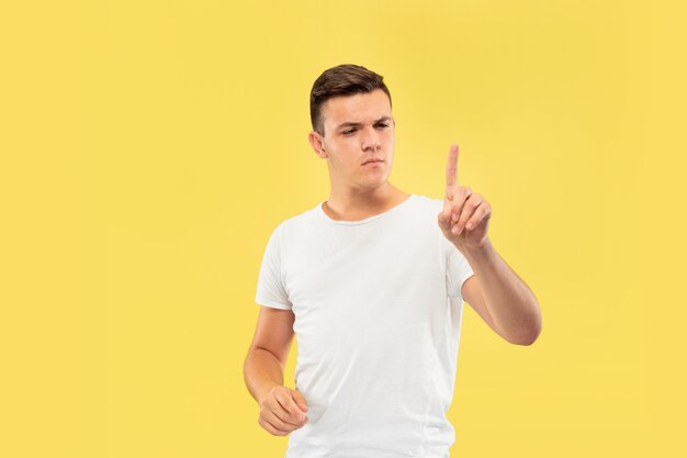 Caucasian young man's half-length portrait  Beautiful male model in shirt