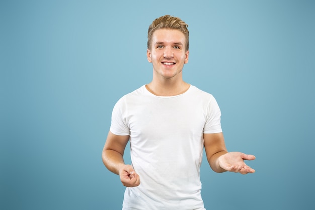 Caucasian young man's half-length portrait. Beautiful male model in shirt