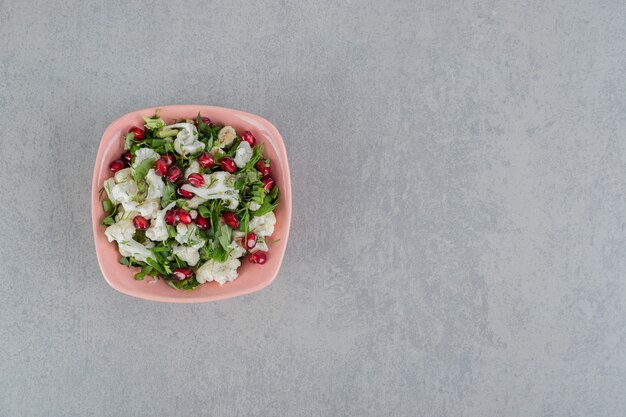 Cauliflower salad with herbs and pomegranate seeds.