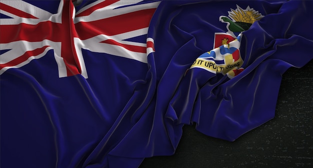 Free photo cayman islands flag wrinkled on dark background 3d render
