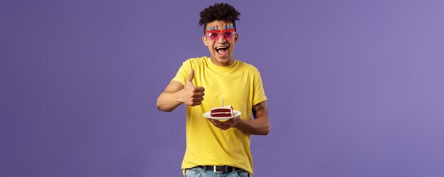 Celebration party and holidays concept portrait of upbeat cheerful young happy man celebrating birth