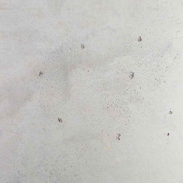 Free photo cement wall surface with holes