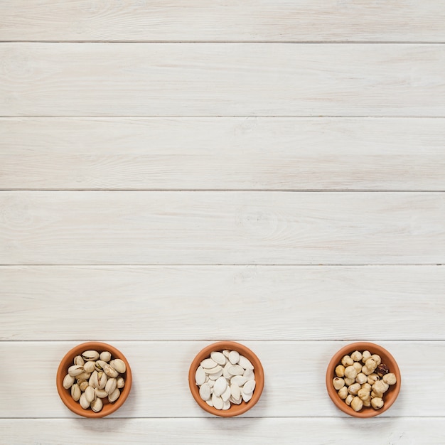 Ceramic bowls with nuts and seeds