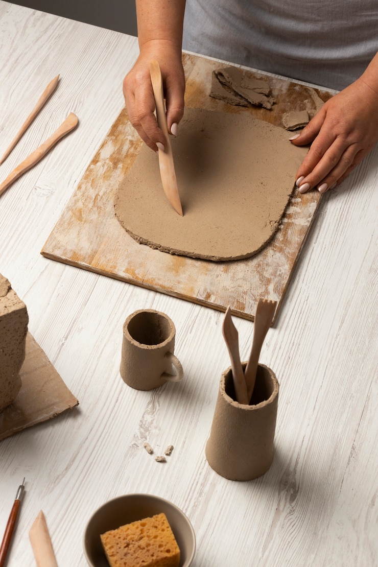 Free Photo ceramic and pottery tools still life