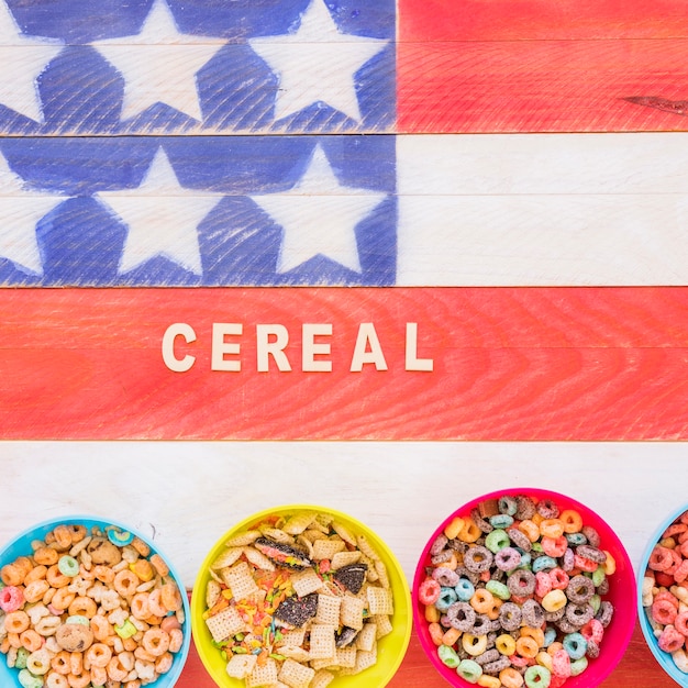 Free photo cereal inscription with bowls on bright table