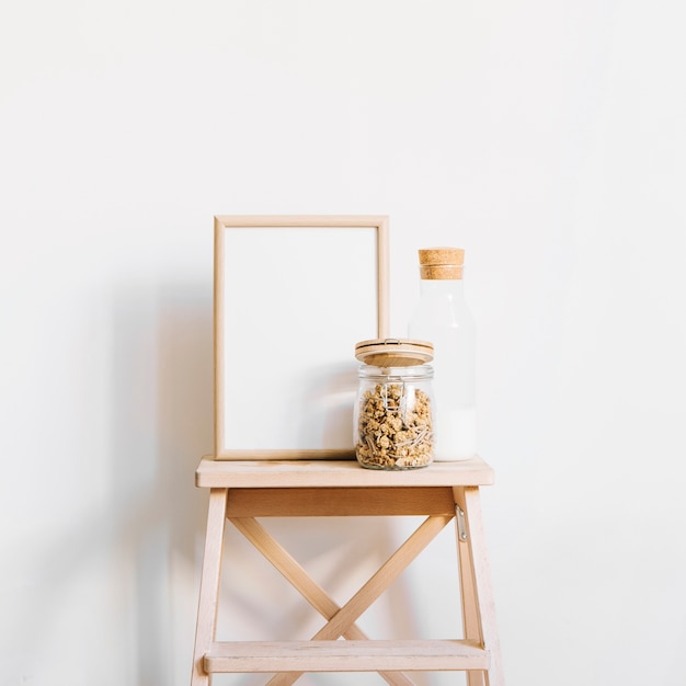 Free photo cereals and frame on stool