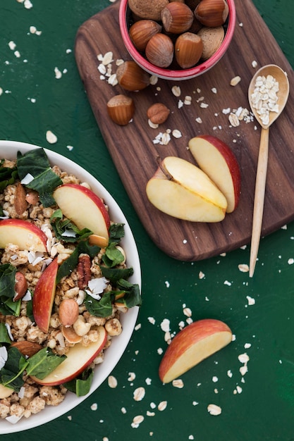 Cereals and slices of apple top view