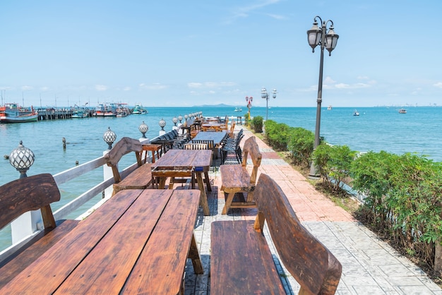 chair and table at terrace restaurant with sea view