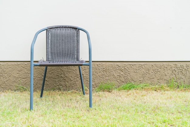 Free photo chair with empty wall