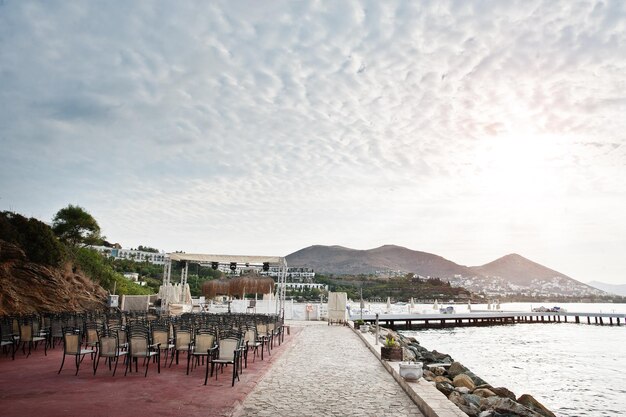 Chairs outside on veranda of restaurant overlooking the Bodrum resort Turkey