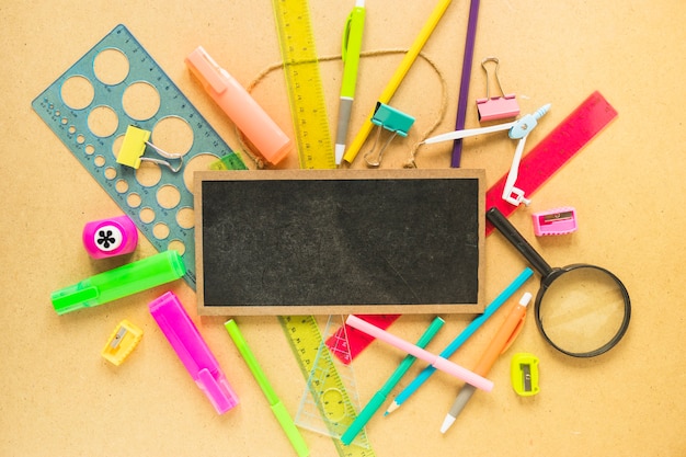 Chalkboard lying on stationery