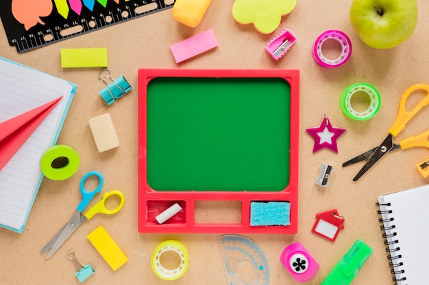 Free photo chalkboard surrounded by sticky tape