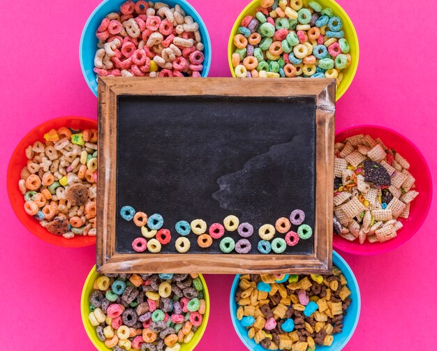 Chalkboard with cereals on bright bowls