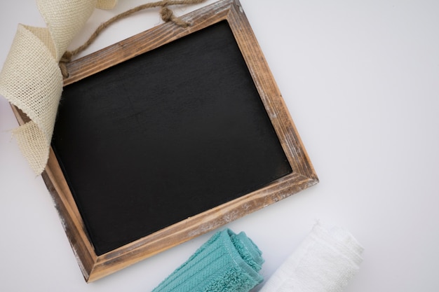 Chalkboard with towel and tape