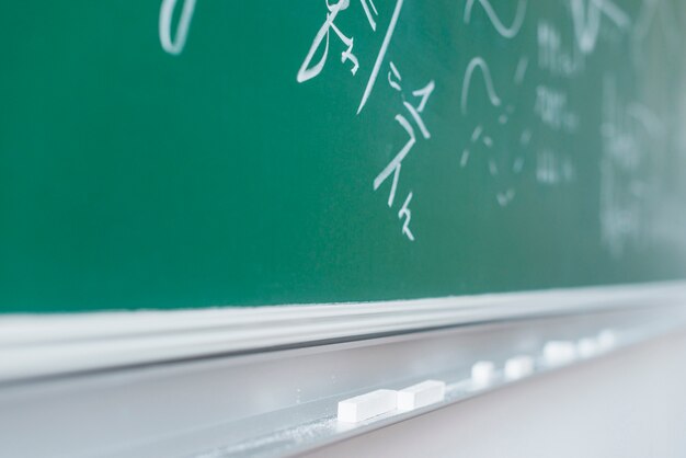 Chalkboard with written mathematical formulas