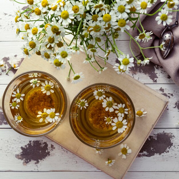 Chamomile tea cups flat lay