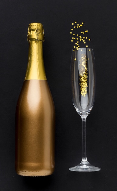 Champagne bottle with glass