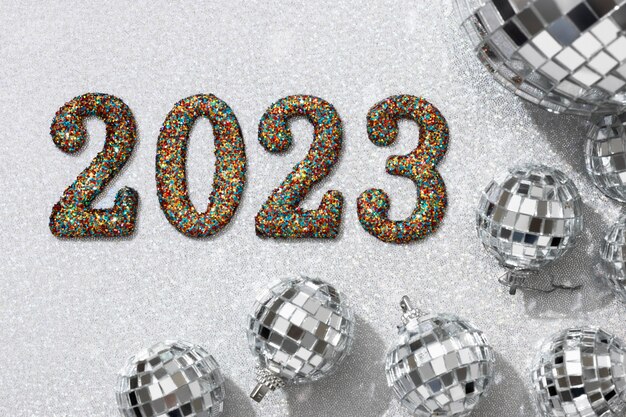 Change of year with disco balls flat lay