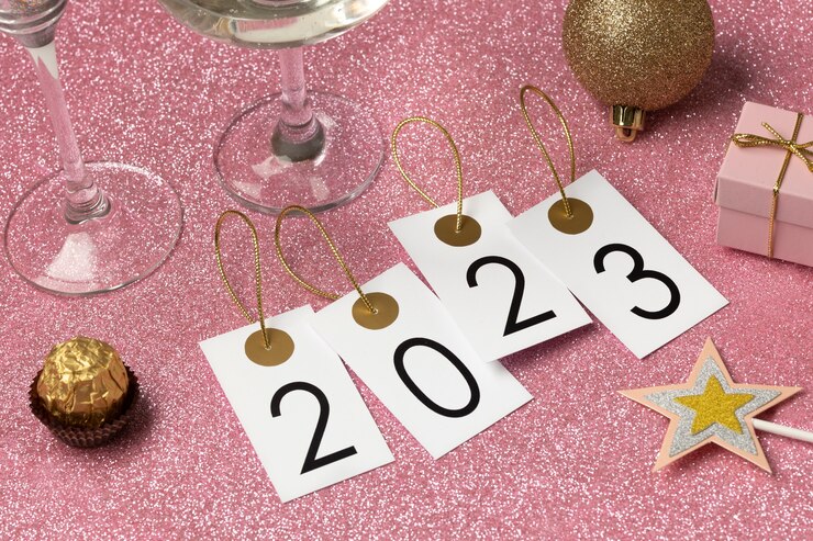 Free Photo change of year with glitter background high angle