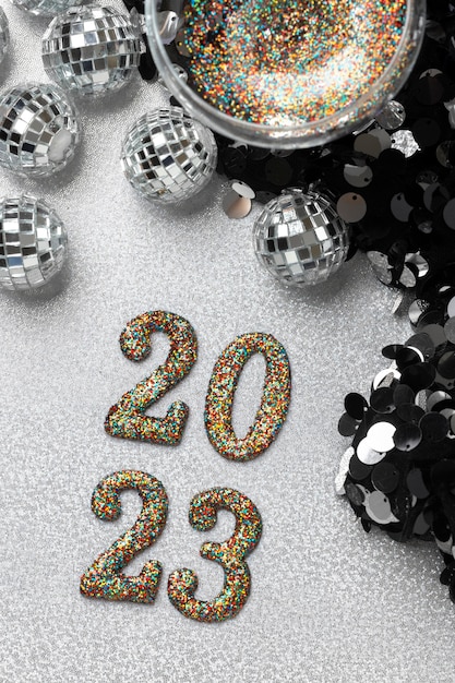 Free photo change of year with glitter flat lay