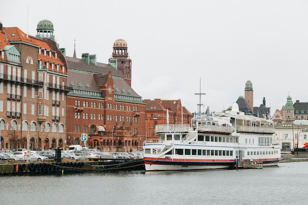 Channel of old city with ship sailing